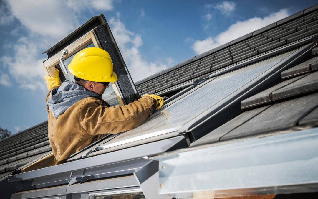 worker-repairing-roof-window-min