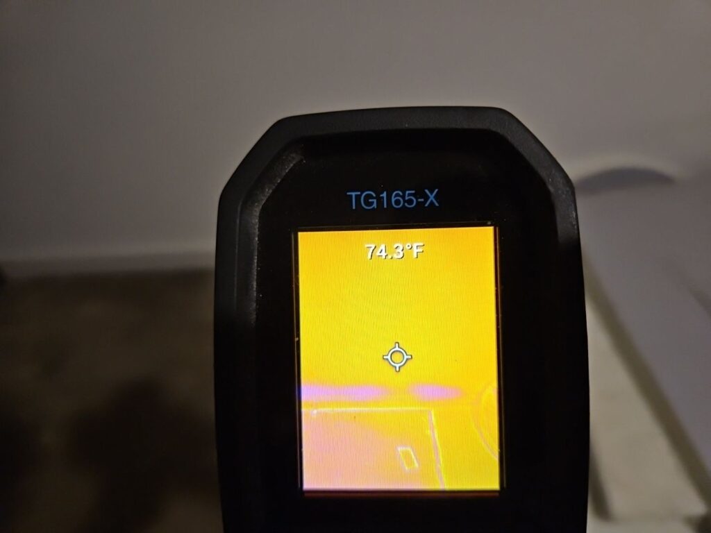 Thermal imaging camera display showing an interior moisture inspection during water mitigation in Waxahachie, TX