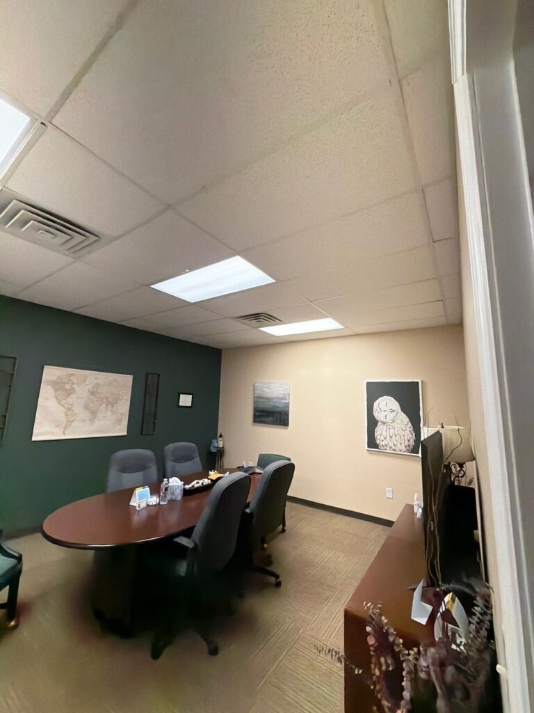 Conference-room drop ceiling and HVAC vents in a commercial office during mold remediation in Commerce, TX
