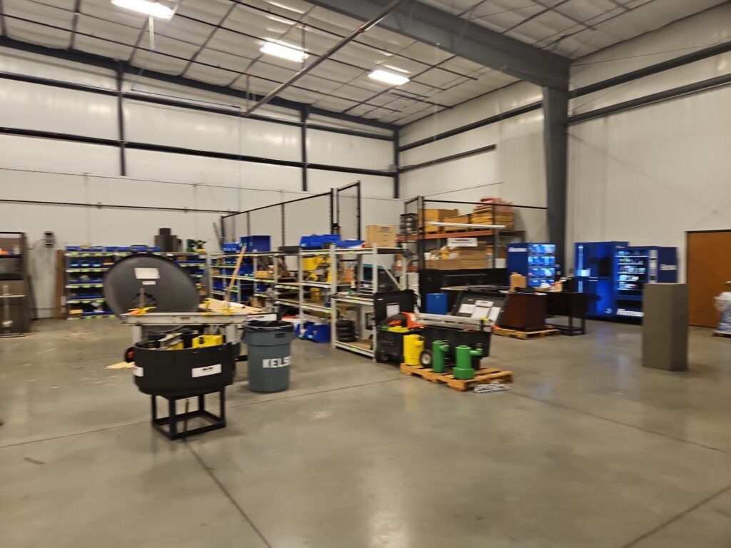 Wide view of a commercial interior with drying equipment during water mitigation in Bonham, TX