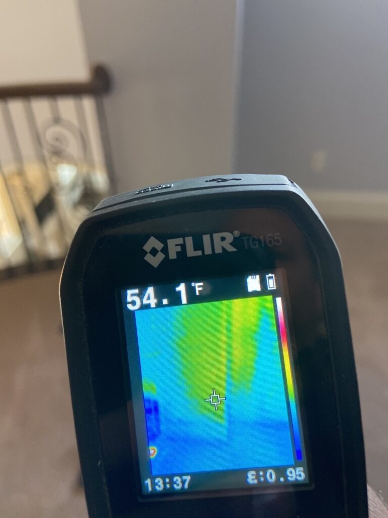 FLIR thermal camera showing temperature variation used to find hidden moisture during a McKinney, TX inspection