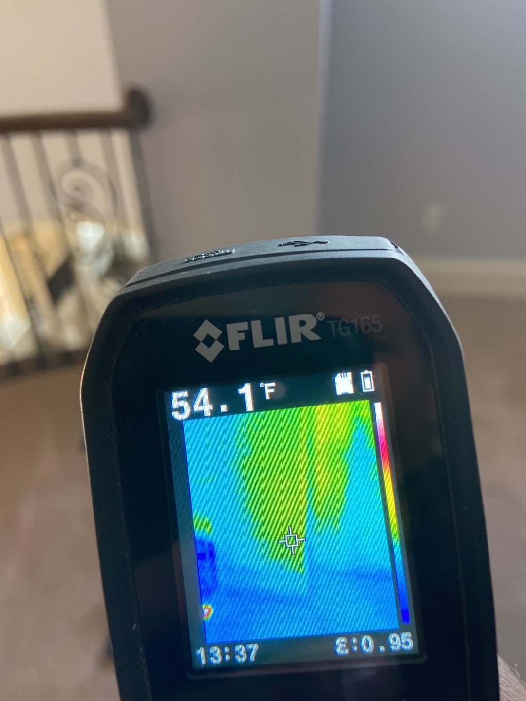 FLIR thermal camera showing temperature variation used to find hidden moisture during a McKinney, TX inspection