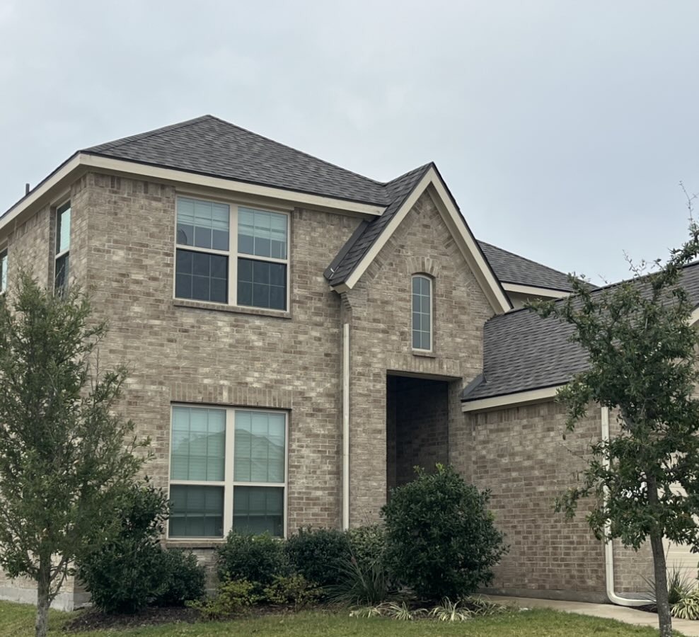 North Texas Home Roof and Exterior Two-story North Texas home with asphalt shingle roof and brick exterior