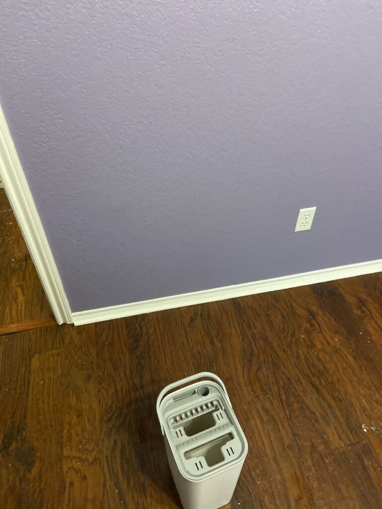 Drying equipment running on hardwood flooring during water mitigation in Carrollton, TX
