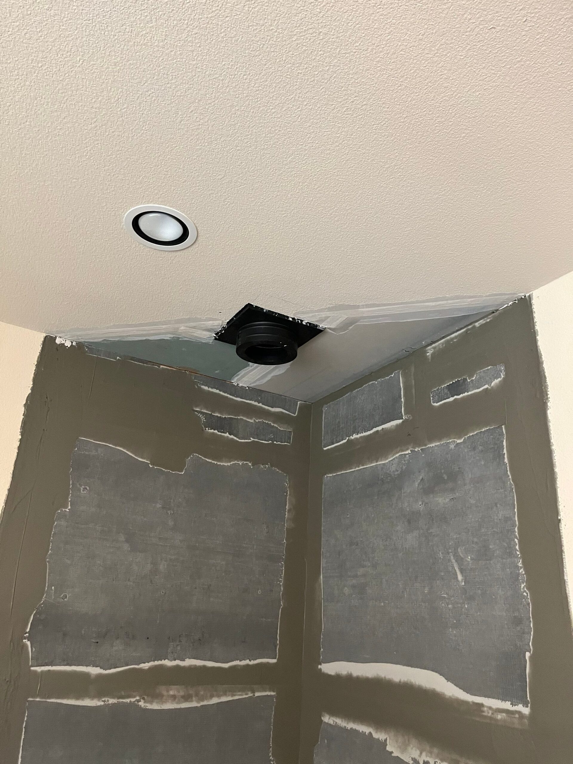 Ledge stone installation underway during the fireplace remodel in Melissa, TX