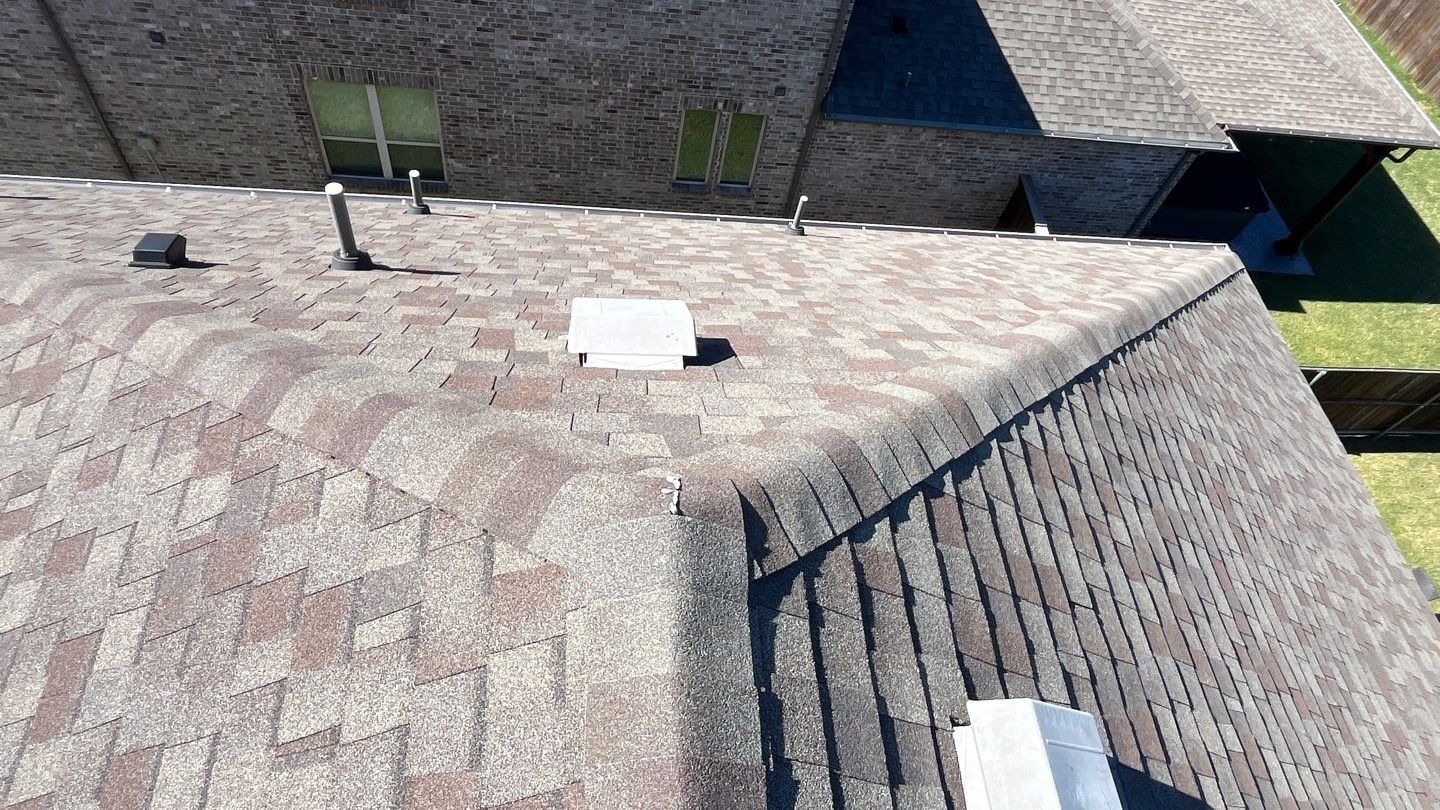 Close-up of worn flashing seam during the roof inspection in Prosper, TX
