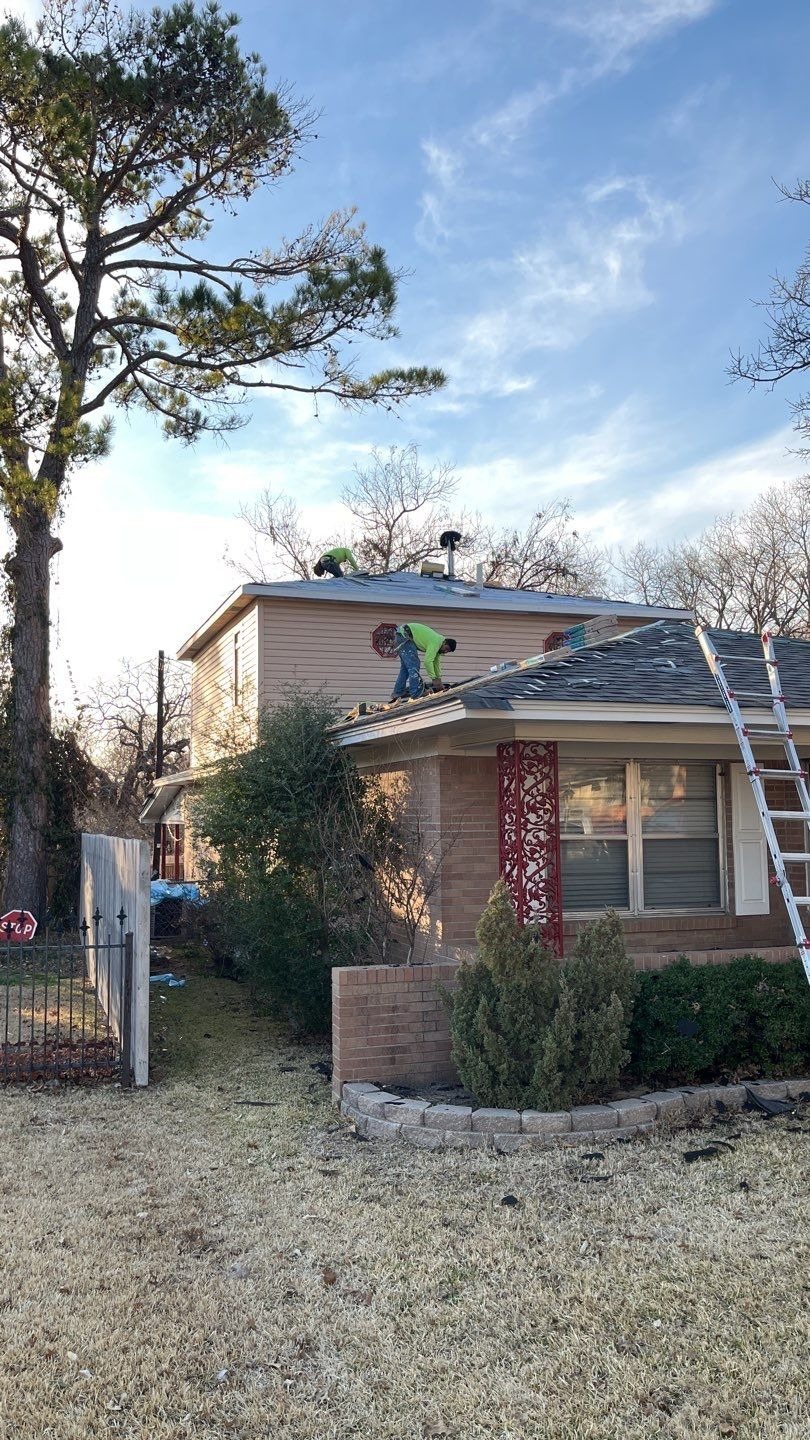 Completed architectural shingle roof after the roof replacement in Sherman, TX
