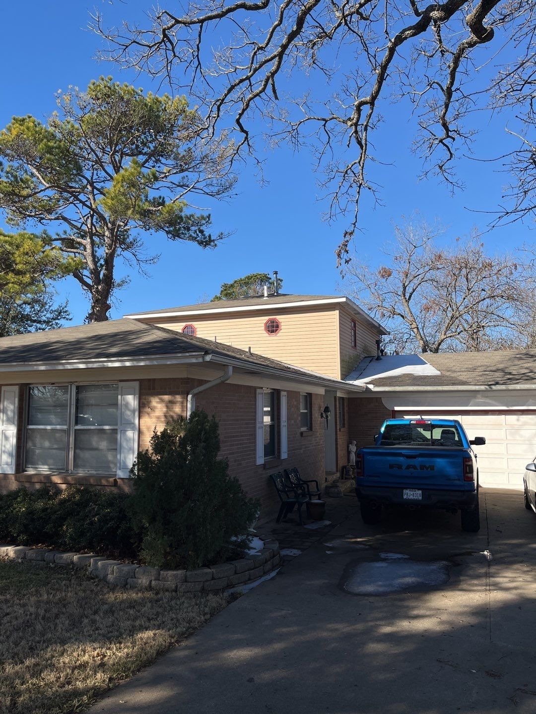 Hail-bruised 3-tab shingles found before the roof replacement in Sherman, TX