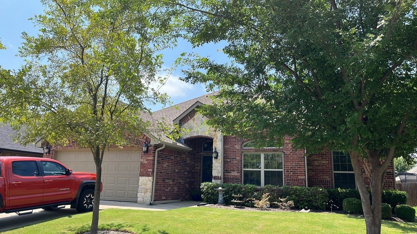 Completed roof with new shingles after the roof replacement in Melissa, TX