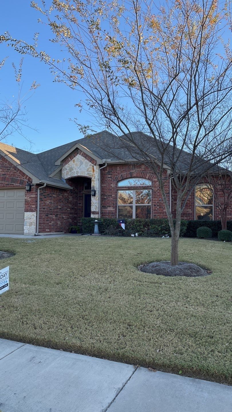 Hail impact marks visible on shingles before the roof replacement in Melissa, TX