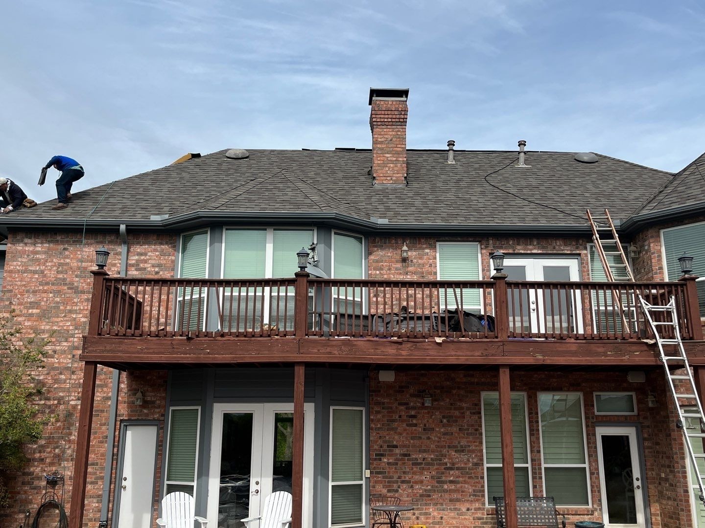 Custom chimney cap fabrication underway during the Sherman roof replacement