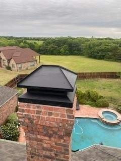 Completed roofline showing new shingles after the Sherman roof replacement