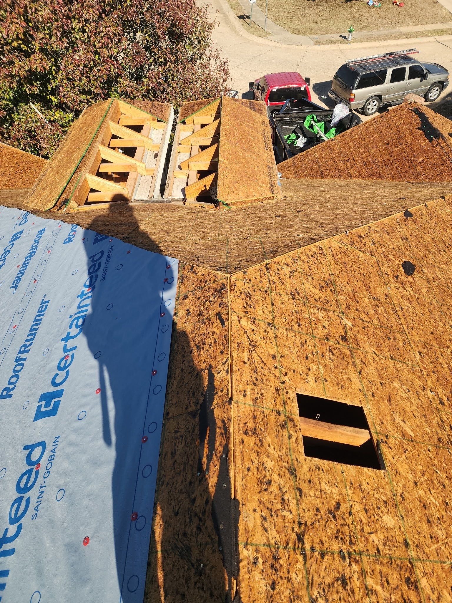During: deteriorated decking sections identified for replacement during Anna roof job