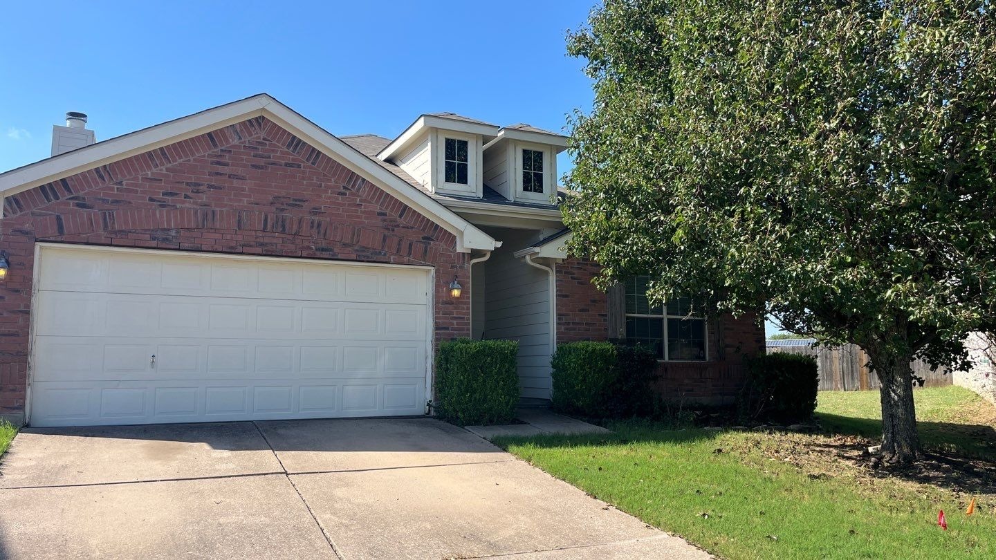 Before: hail-damaged three-tab shingle roof in Anna, TX before roof replacement begins
