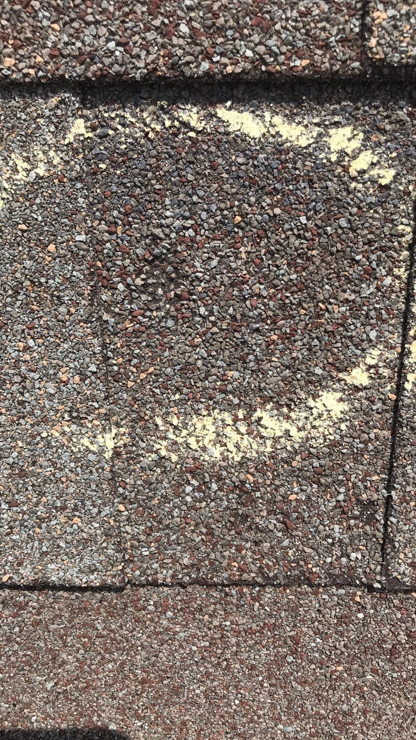 Damaged flashing near a roof valley before the roof replacement in Melissa, TX
