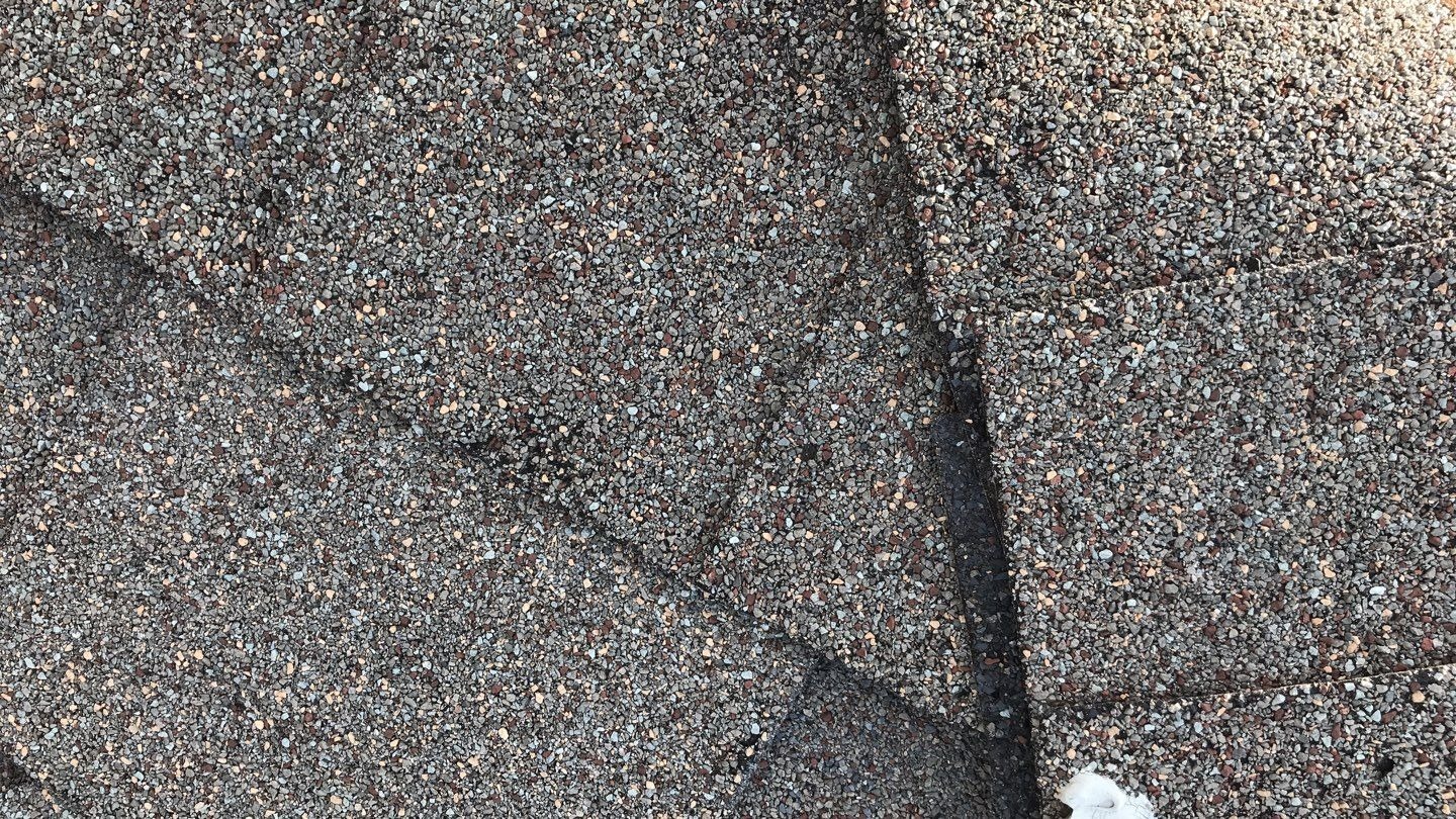 Granule loss on a roof slope before the roof replacement in Melissa, TX
