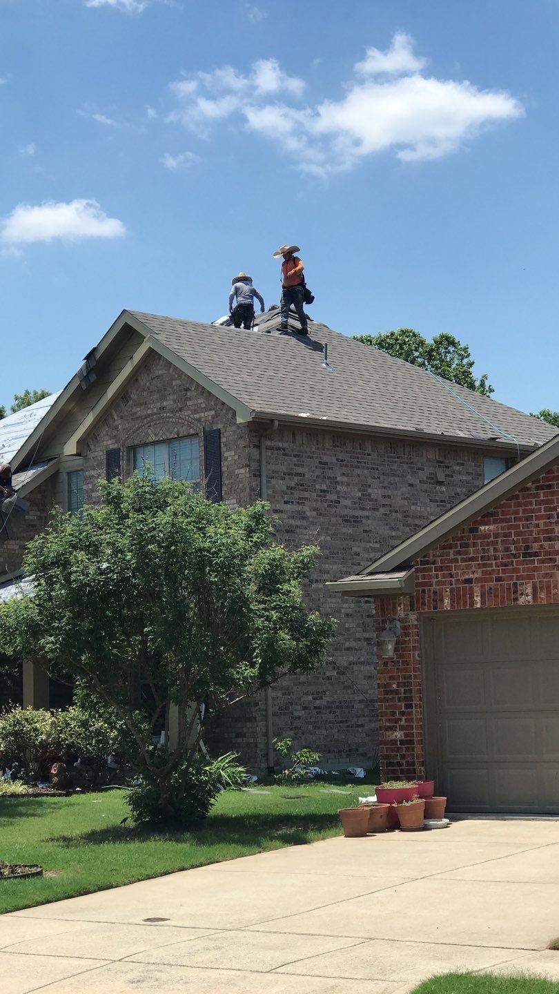 During roof replacement in Anna: new synthetic underlayment installed with ice and water shield in valleys
