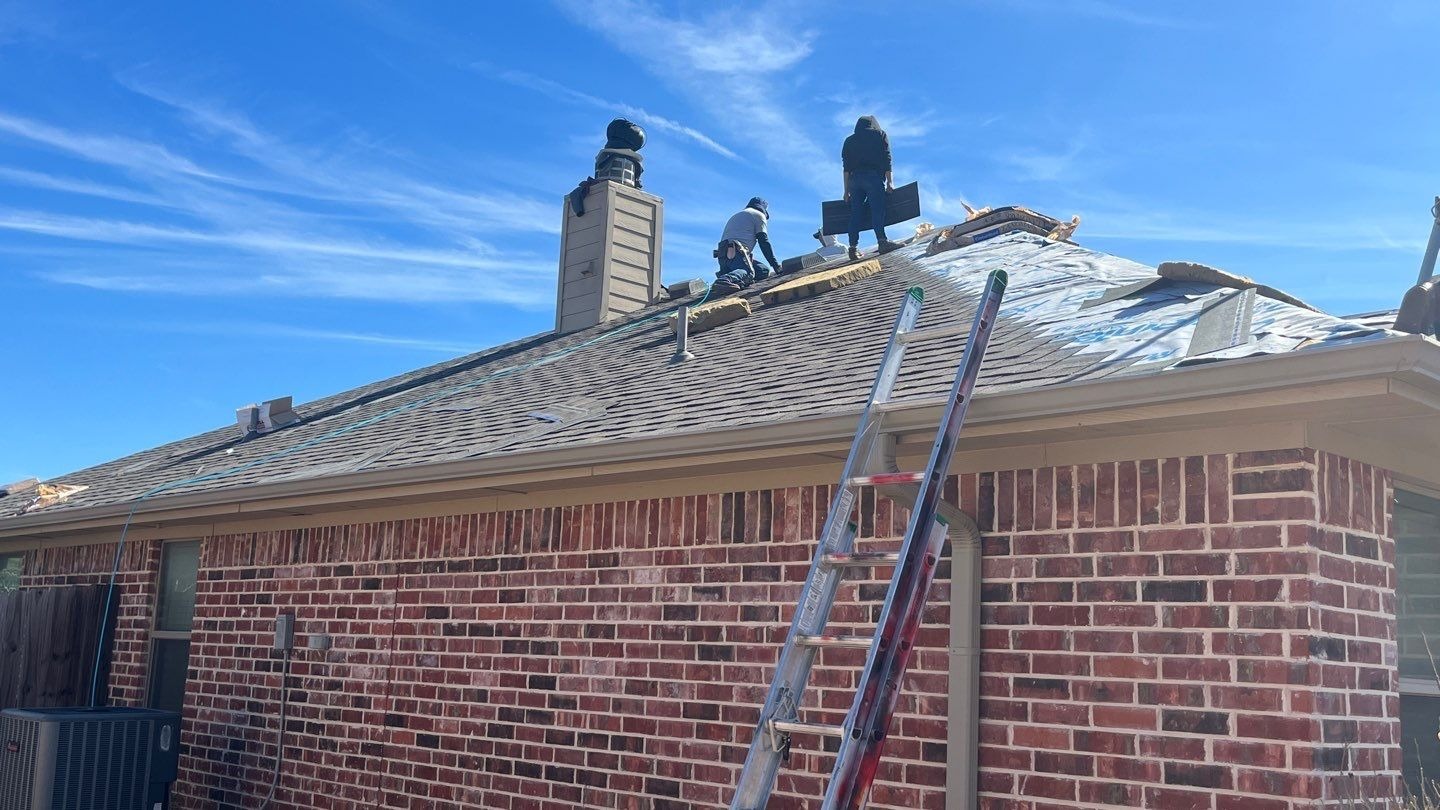Exposed roof deck visible during the roof replacement in Sherman, TX