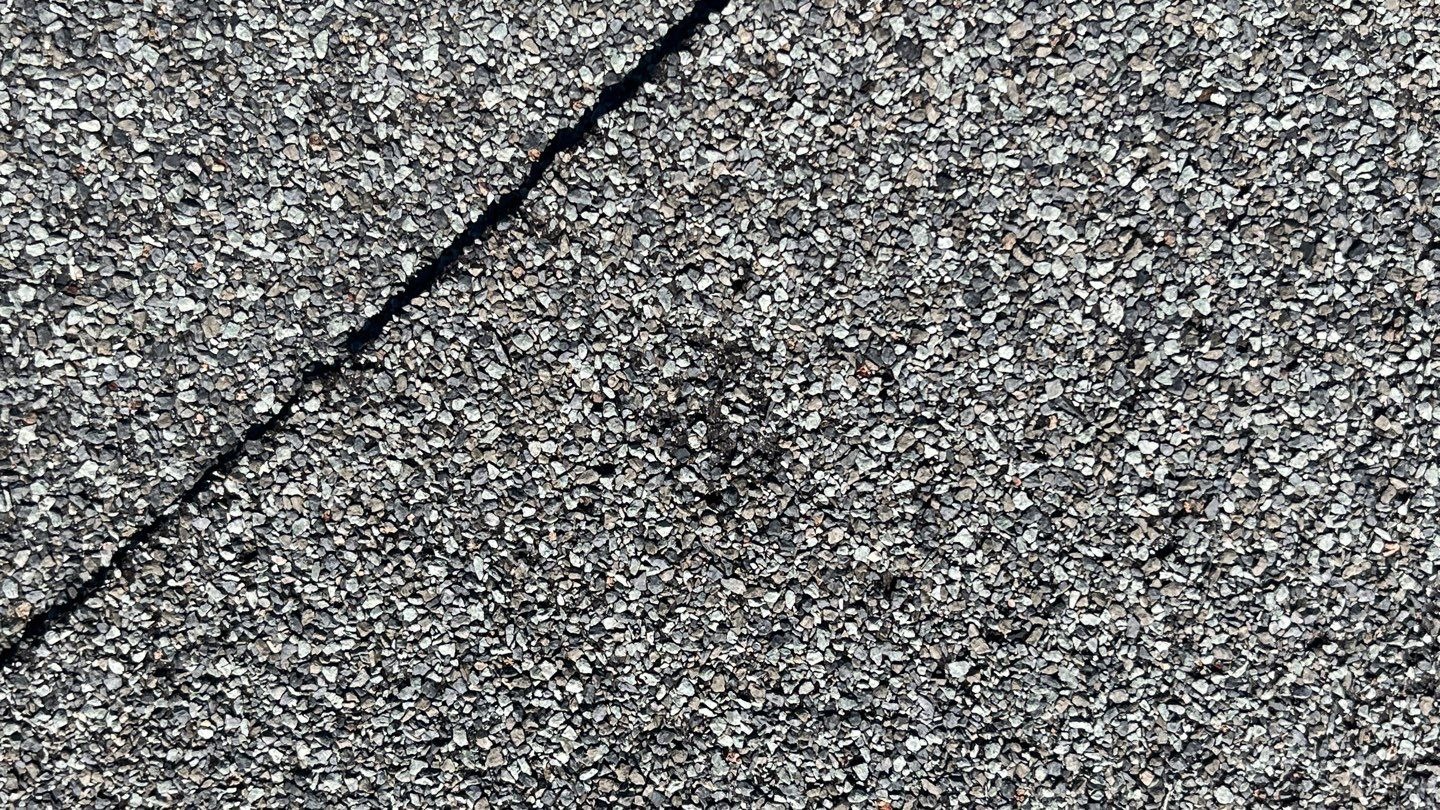 Hail damage on flashing found before the roof replacement in Sherman, TX