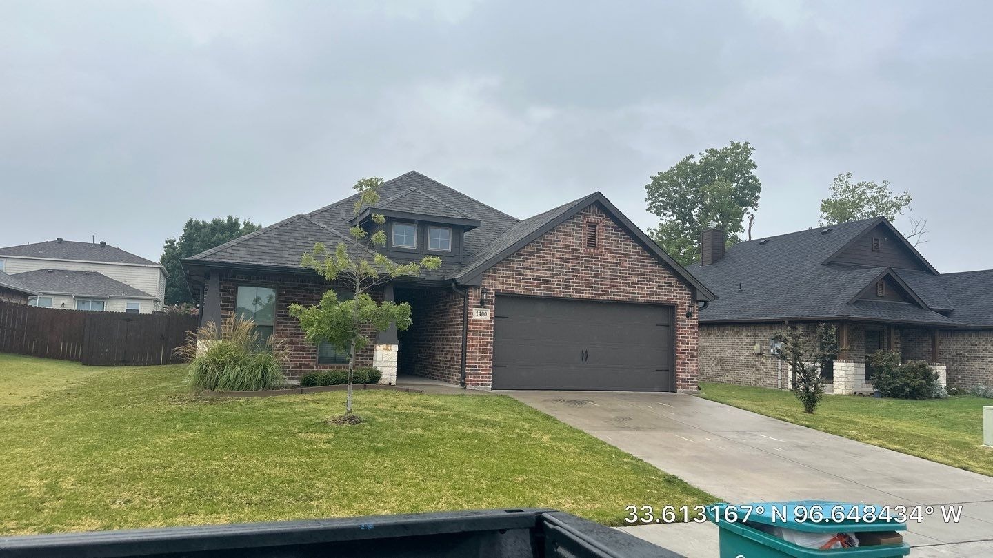 Completed new roof after the roof replacement in Sherman, TX