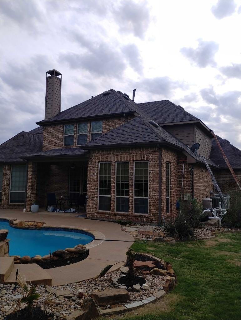 New gutter system installed after the roof replacement in Prosper, TX