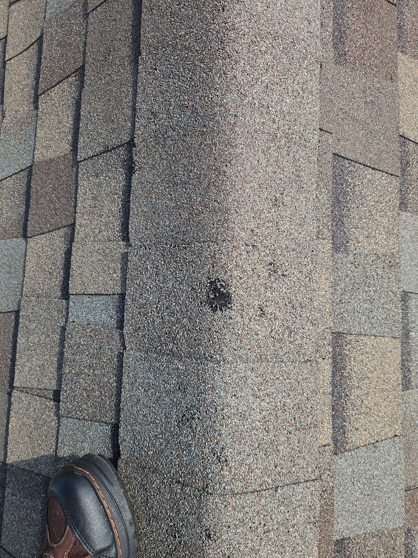 Before photo showing missing shingles and flashing damage on Anna roof