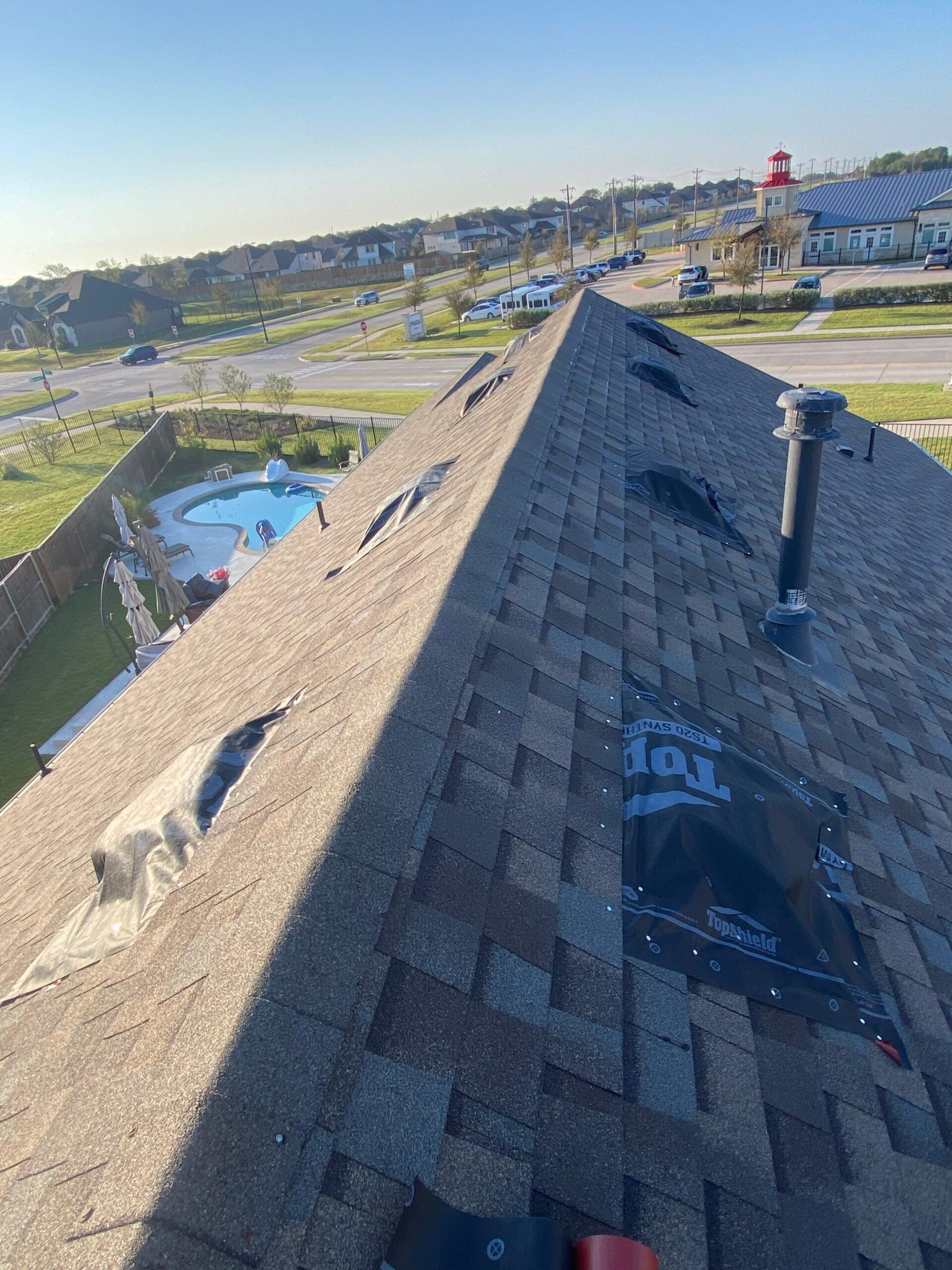 After photo of finished tarp-over protecting damaged vents in Anna, TX