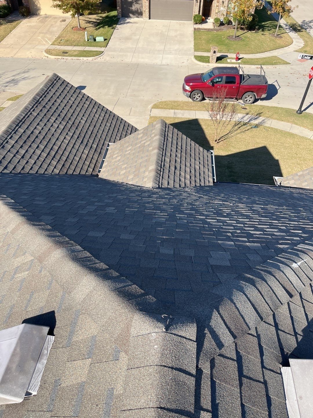 Wind-lifted shingles found during the pre-work inspection in Melissa, TX