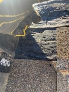 Replacement vent being sealed during the roof repair in Melissa, TX
