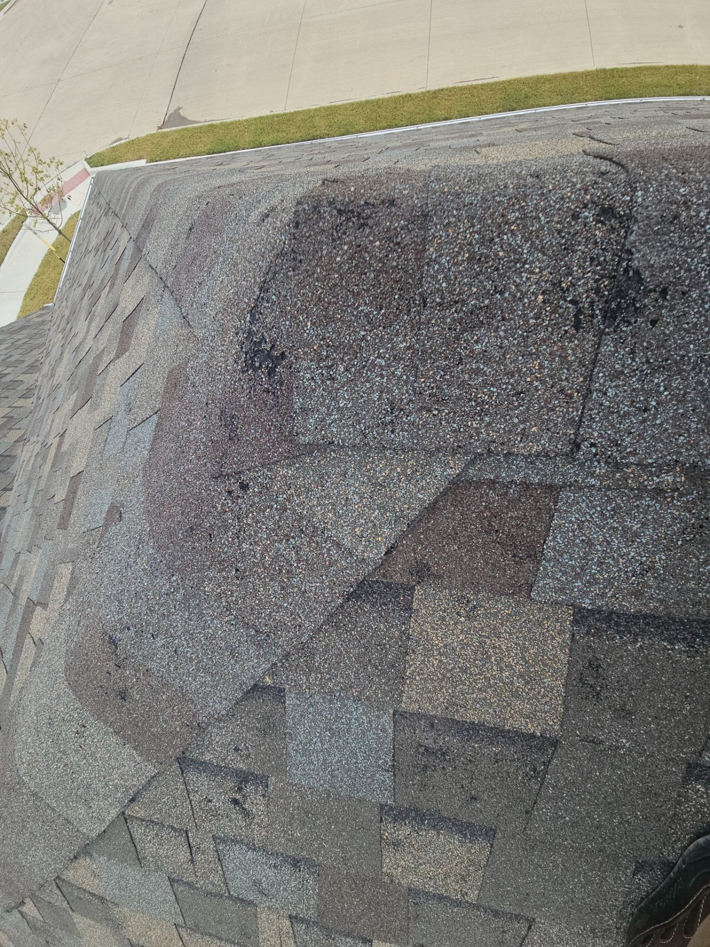 Before roof replacement in Anna: broken exterior light fixture noted during the storm damage assessment