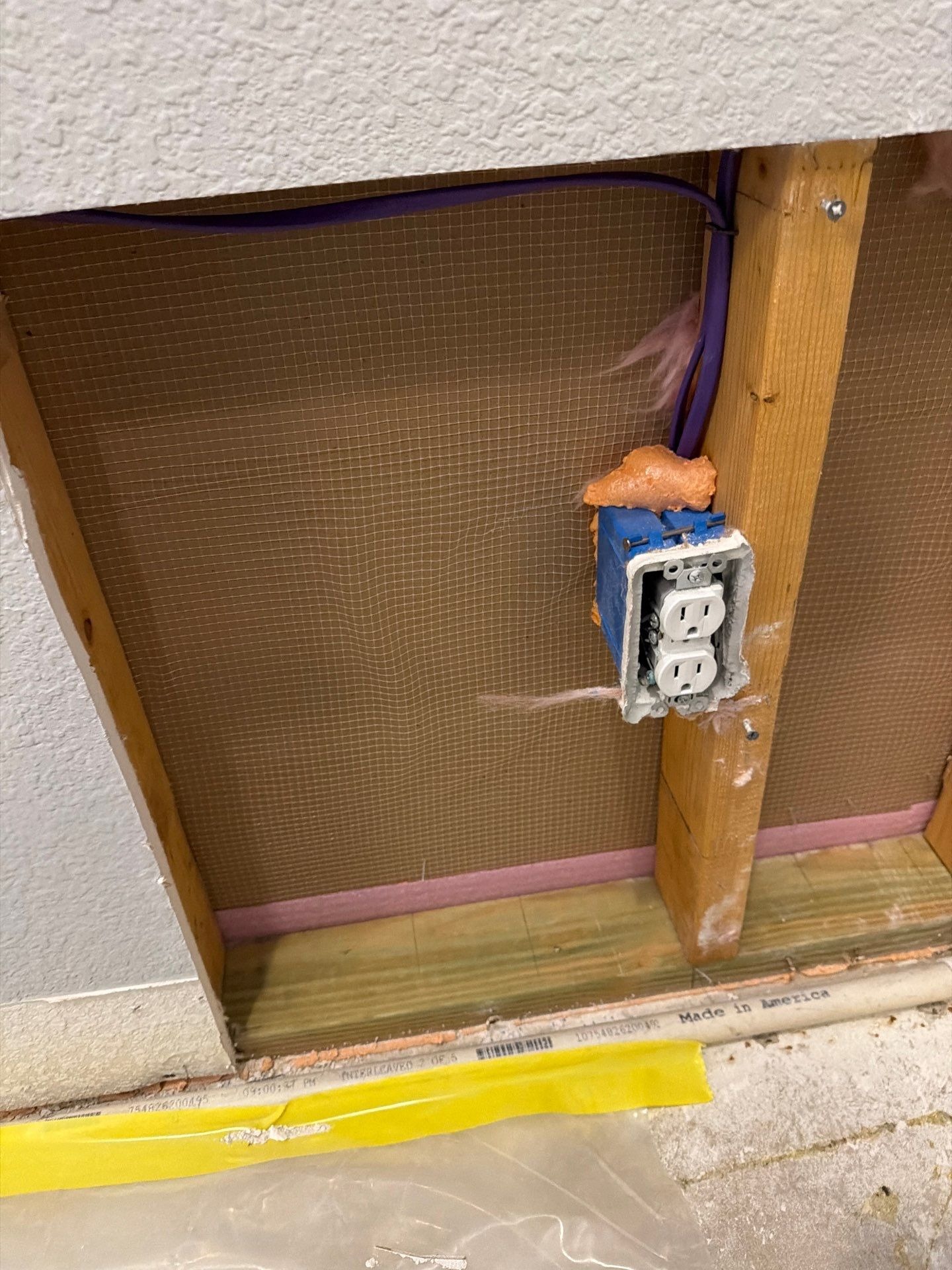 Containment barrier and HEPA air scrubber set up during mold remediation in Melissa, TX