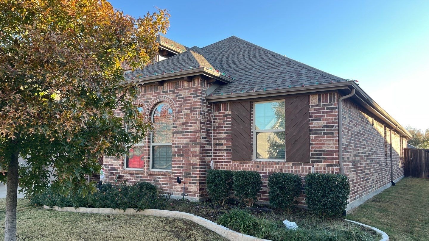 Lifted shingle edge showing water entry point before roof repair in Melissa, TX