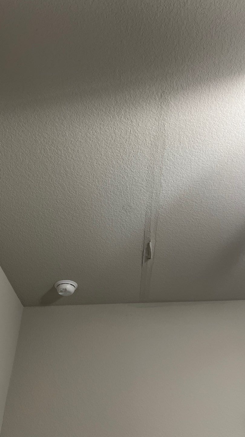 Raised nail head visible through shingle before roof repair in Melissa, TX
