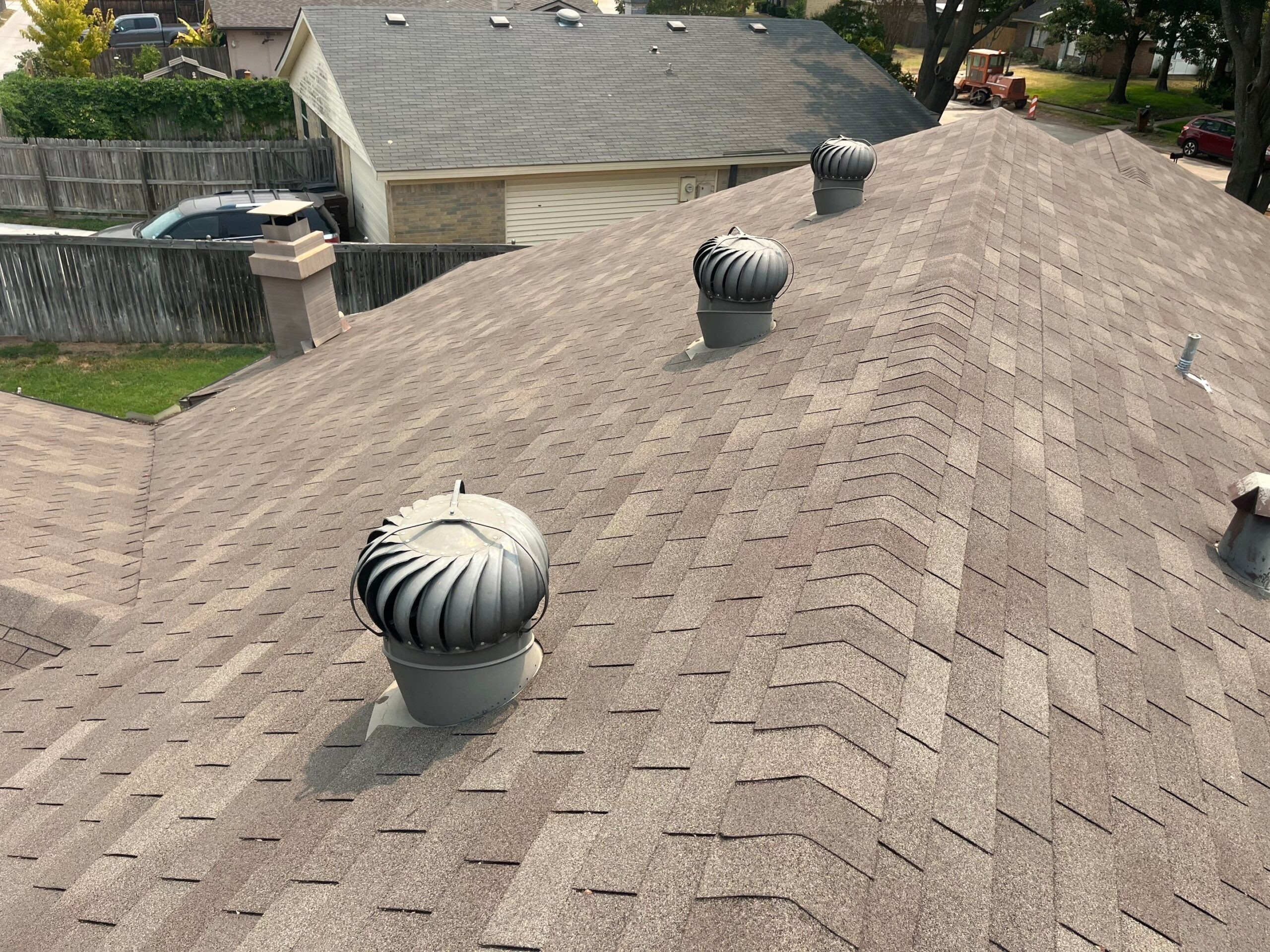 Before: separated caulking near chimney found during roof inspection in Plano rental