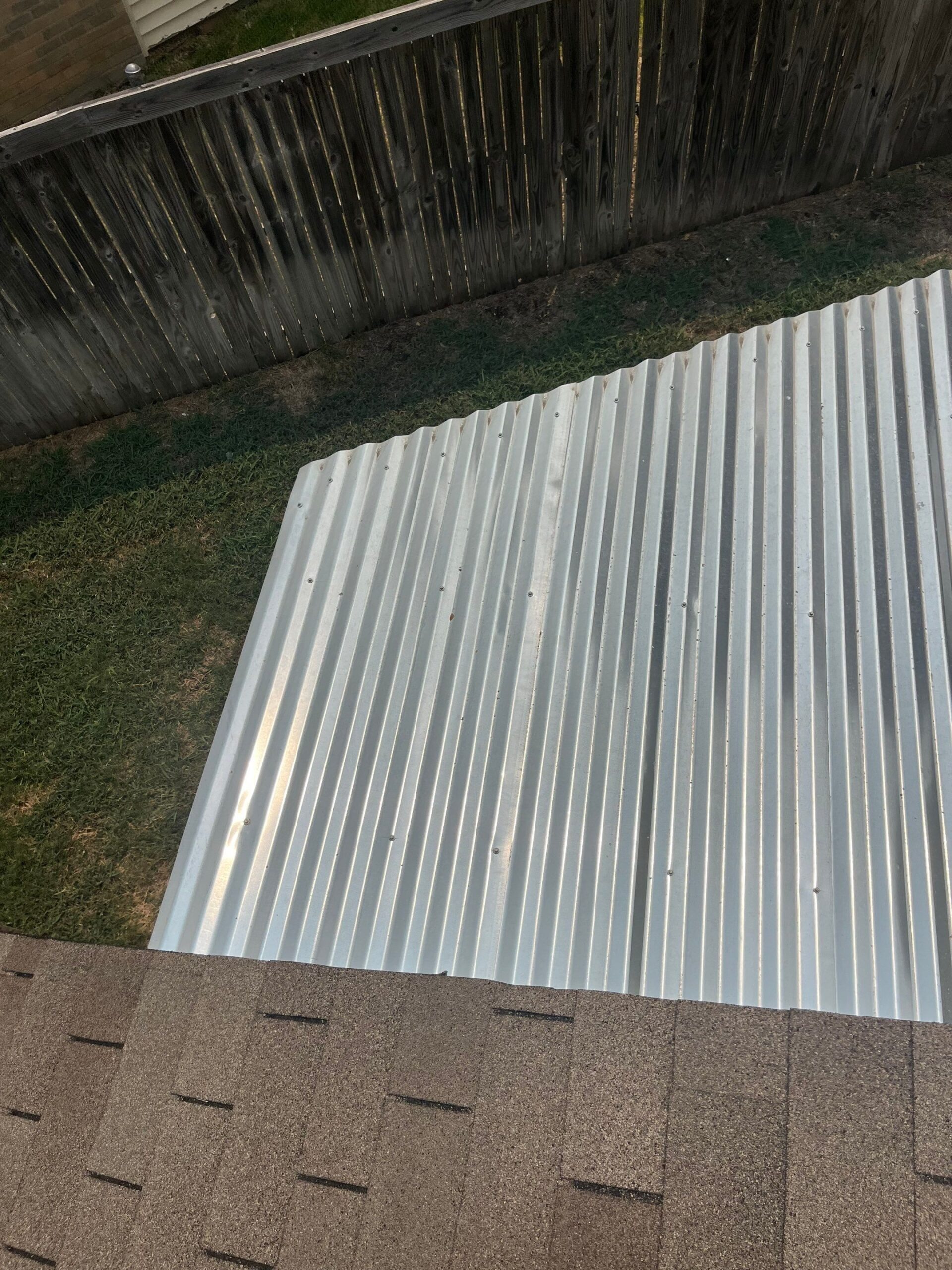 After: documented granule collection sits in low points following Plano roof inspection