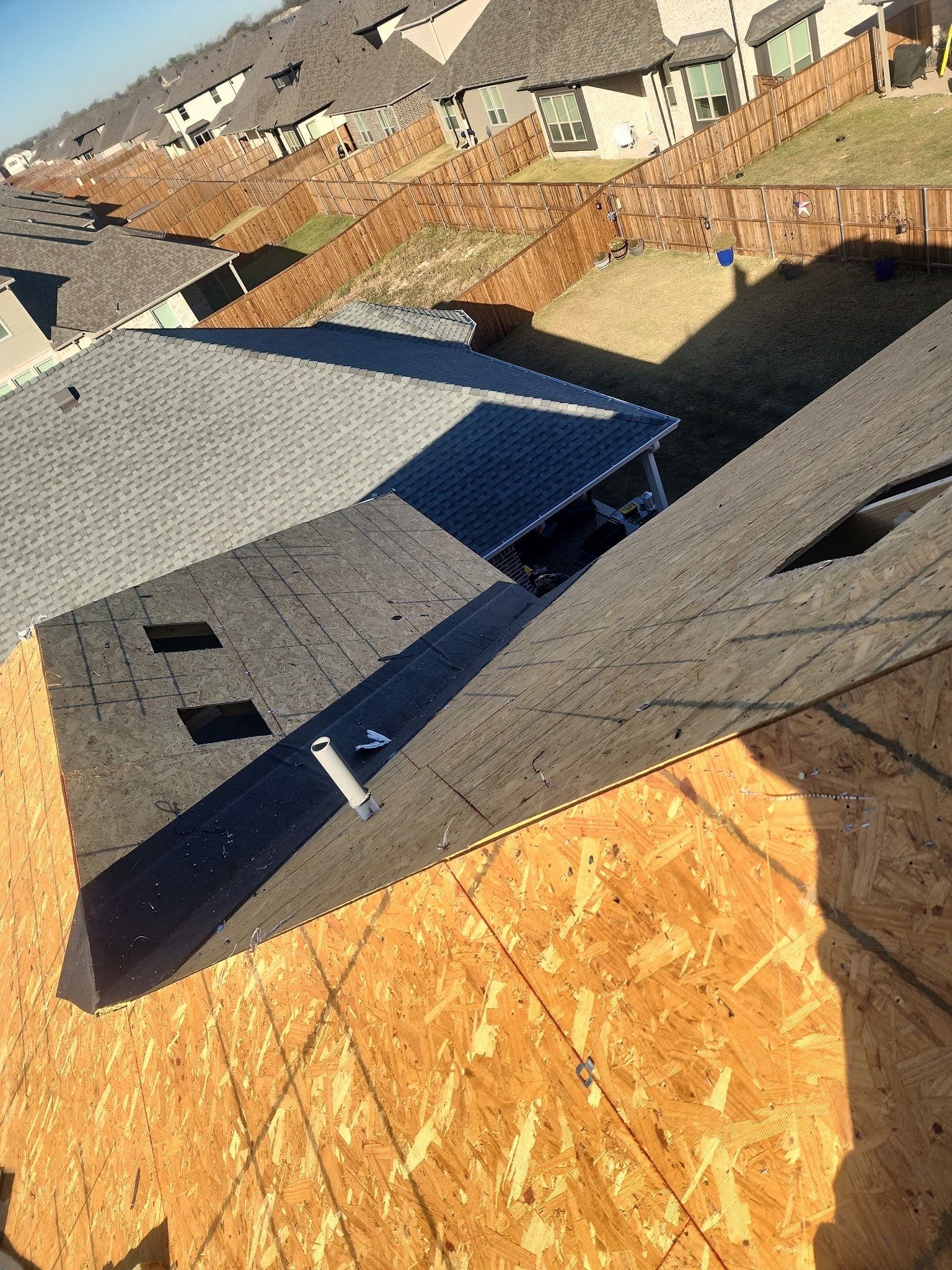 New underlayment installed during roof replacement process in Anna