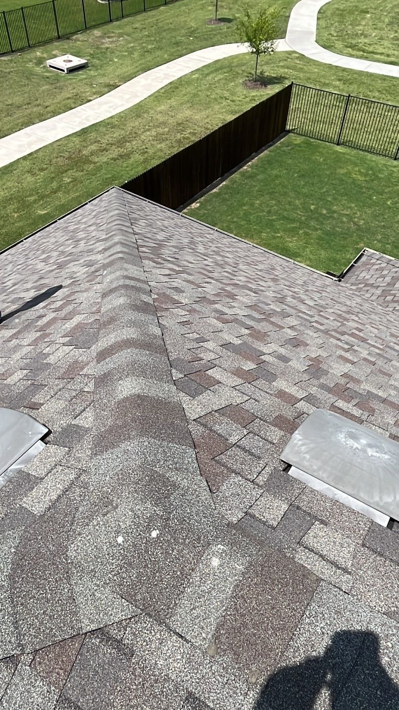 Shingle courses and flashing checked during the roof inspection in Melissa, TX