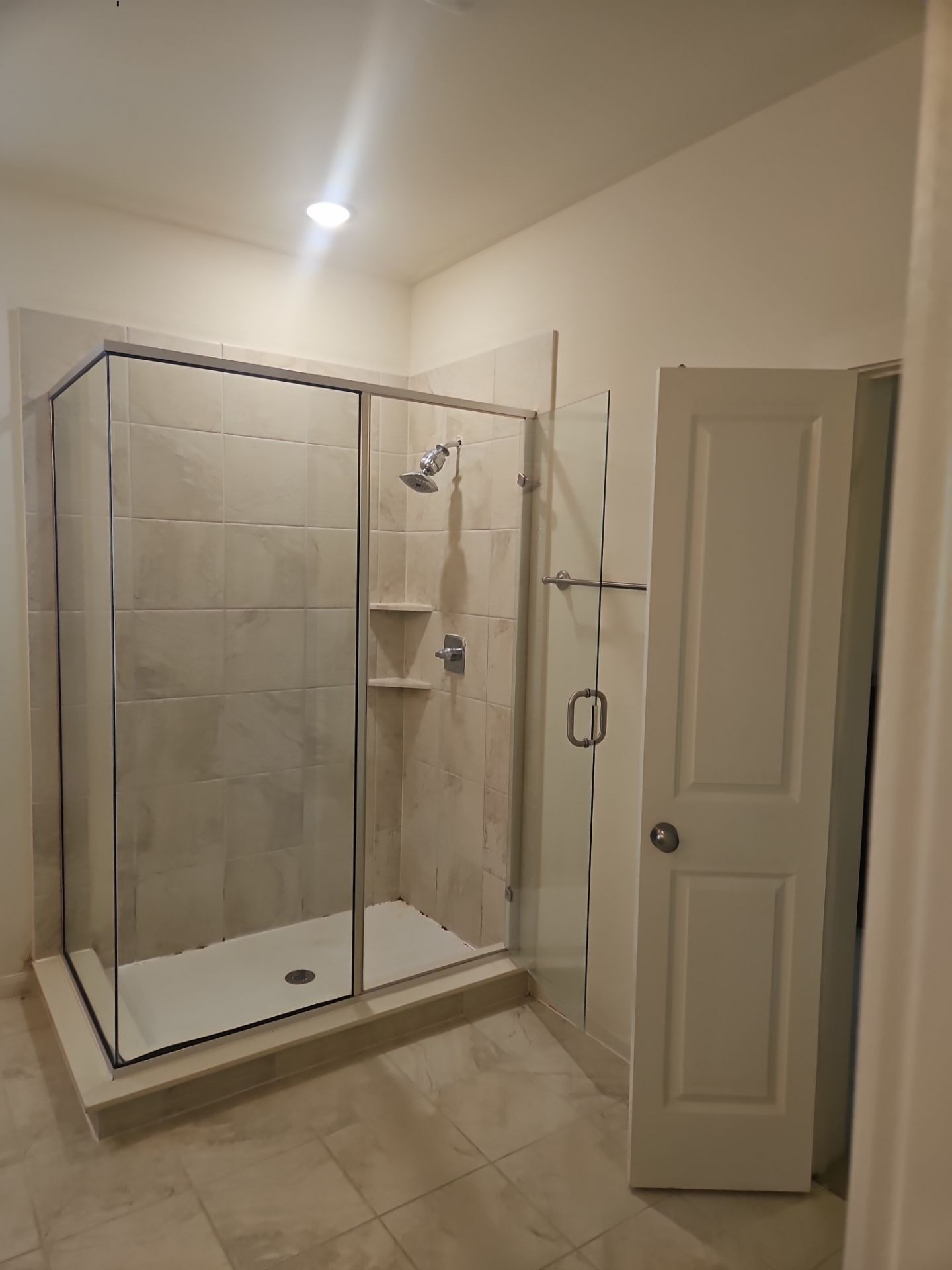 Mold-covered wood framing found behind a shower during mold remediation in McKinney, TX