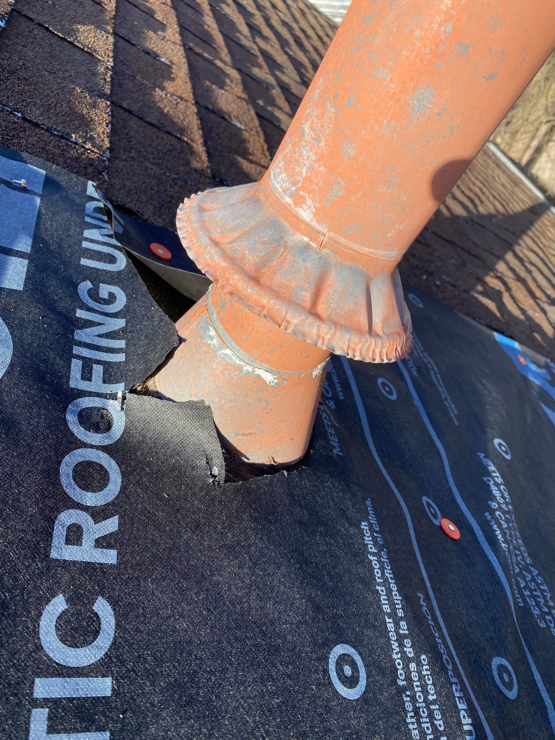 Synthetic underlayment installed over a repaired section during this Sherman, TX roof repair