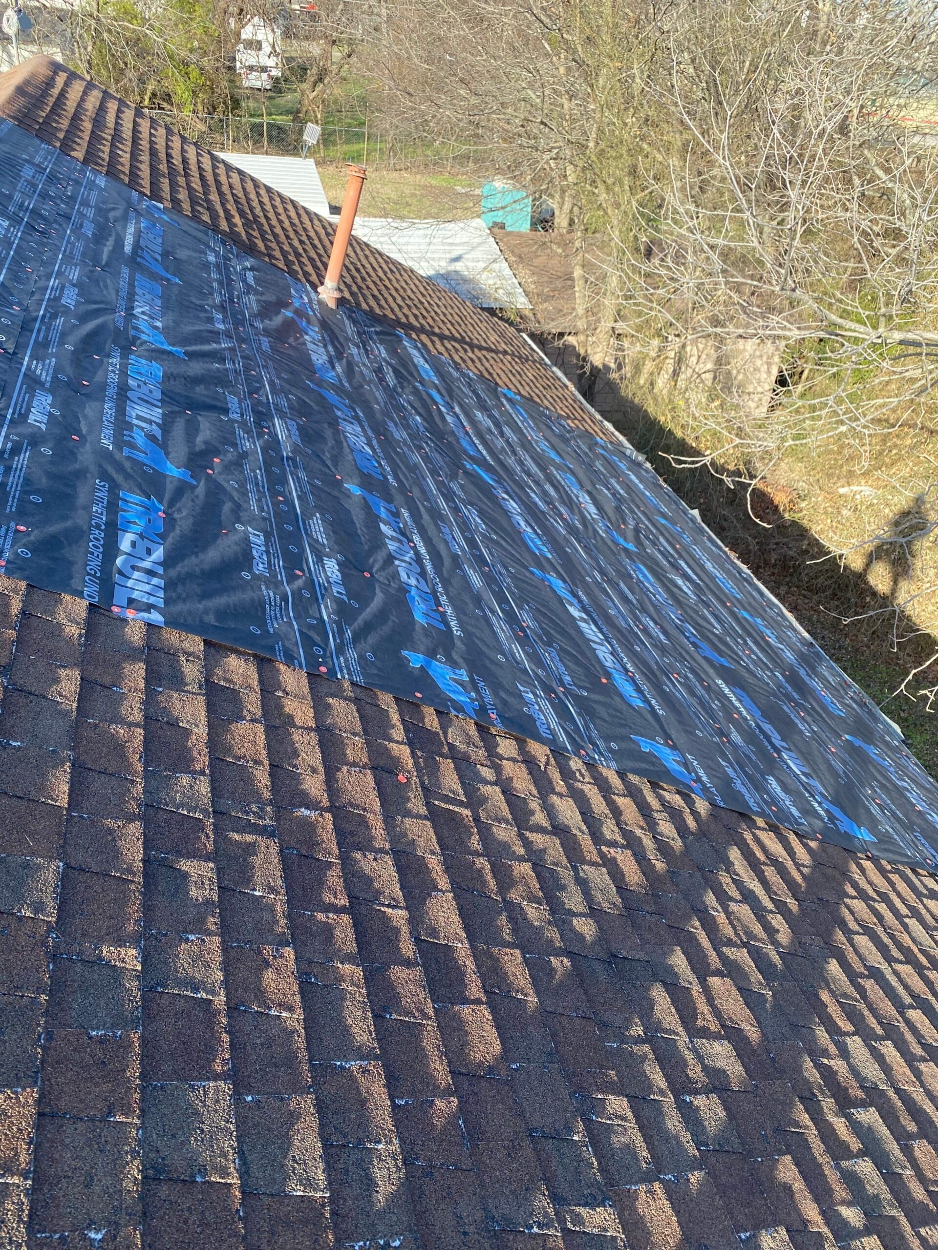 Sealed roof section after the completed roof repair in Sherman, TX