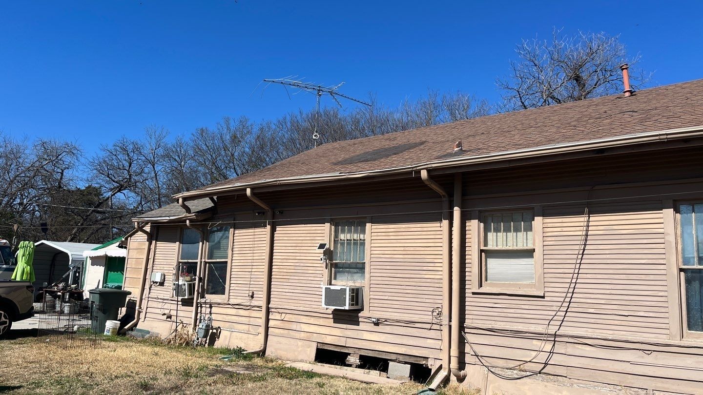 Missing and damaged shingles found during the roof repair in Sherman, TX