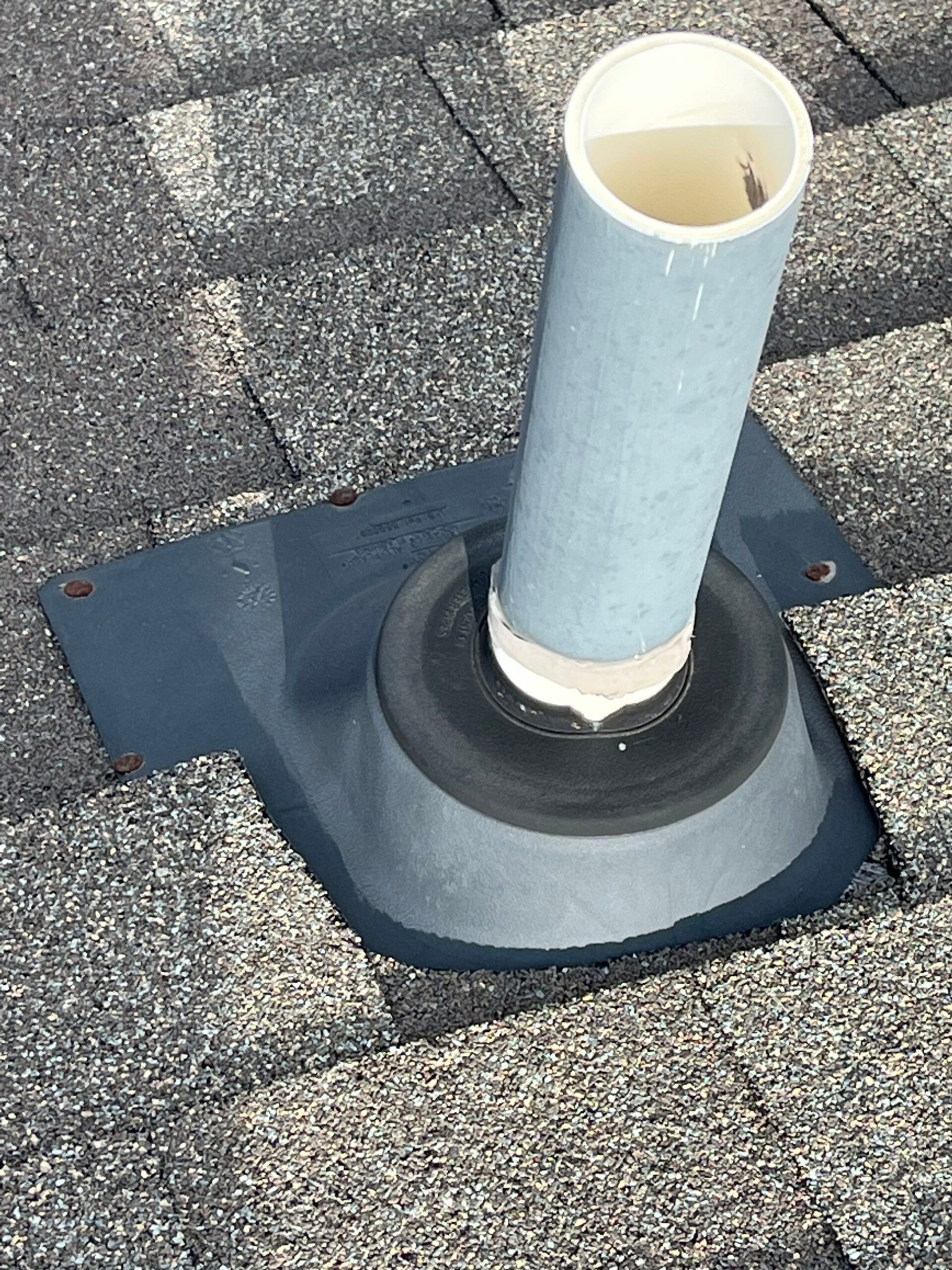 Nail pops visible on shingles before the roof repair in Melissa, TX