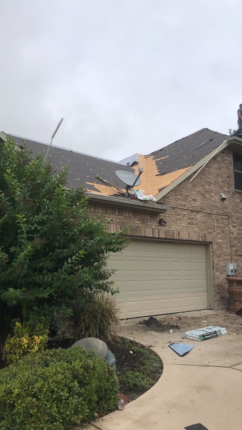 Roof decking exposed after full tear-off during the roof replacement in Melissa, TX