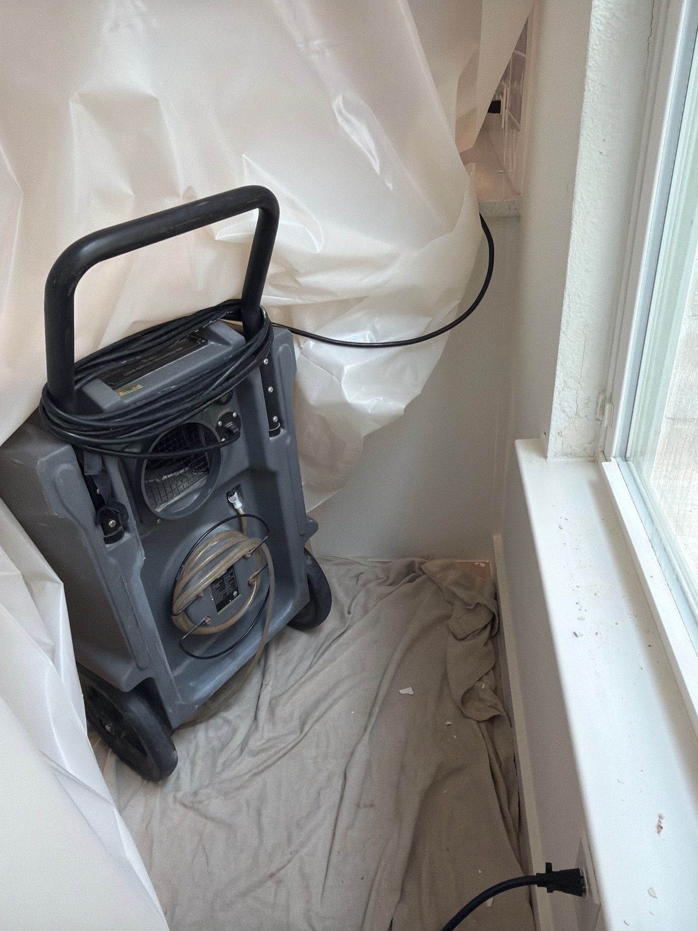 Drying equipment placed in the upstairs room during water damage restoration in Frisco, TX