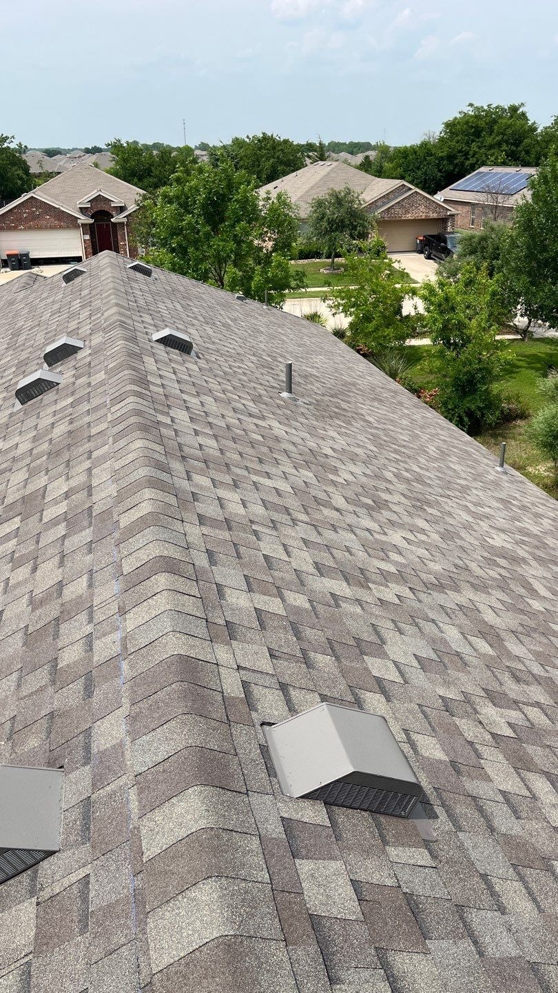 New architectural shingles and replaced vents on the finished roof in Anna, TX