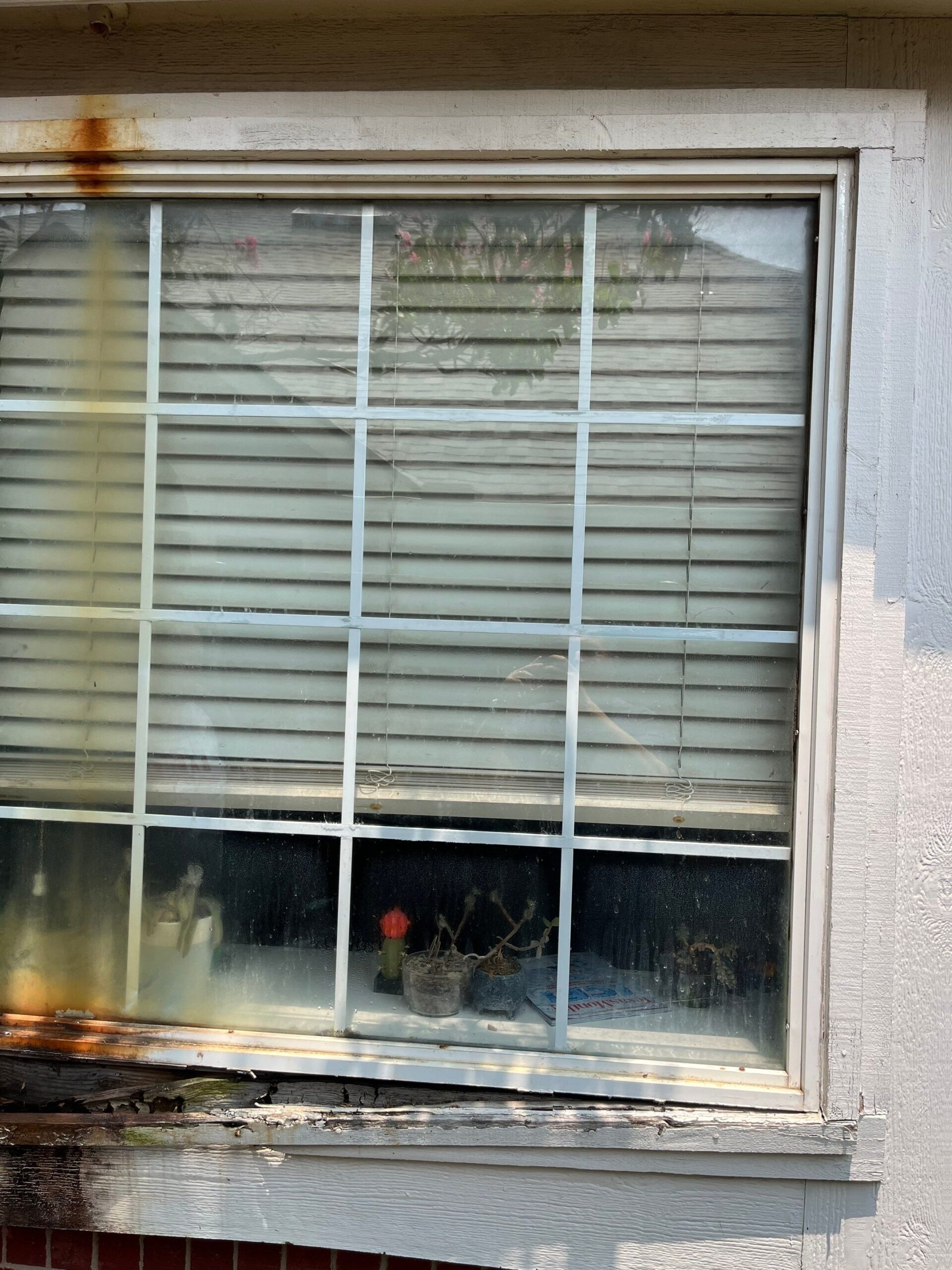 Exposed wall framing after siding removal during reconstruction in Allen, TX