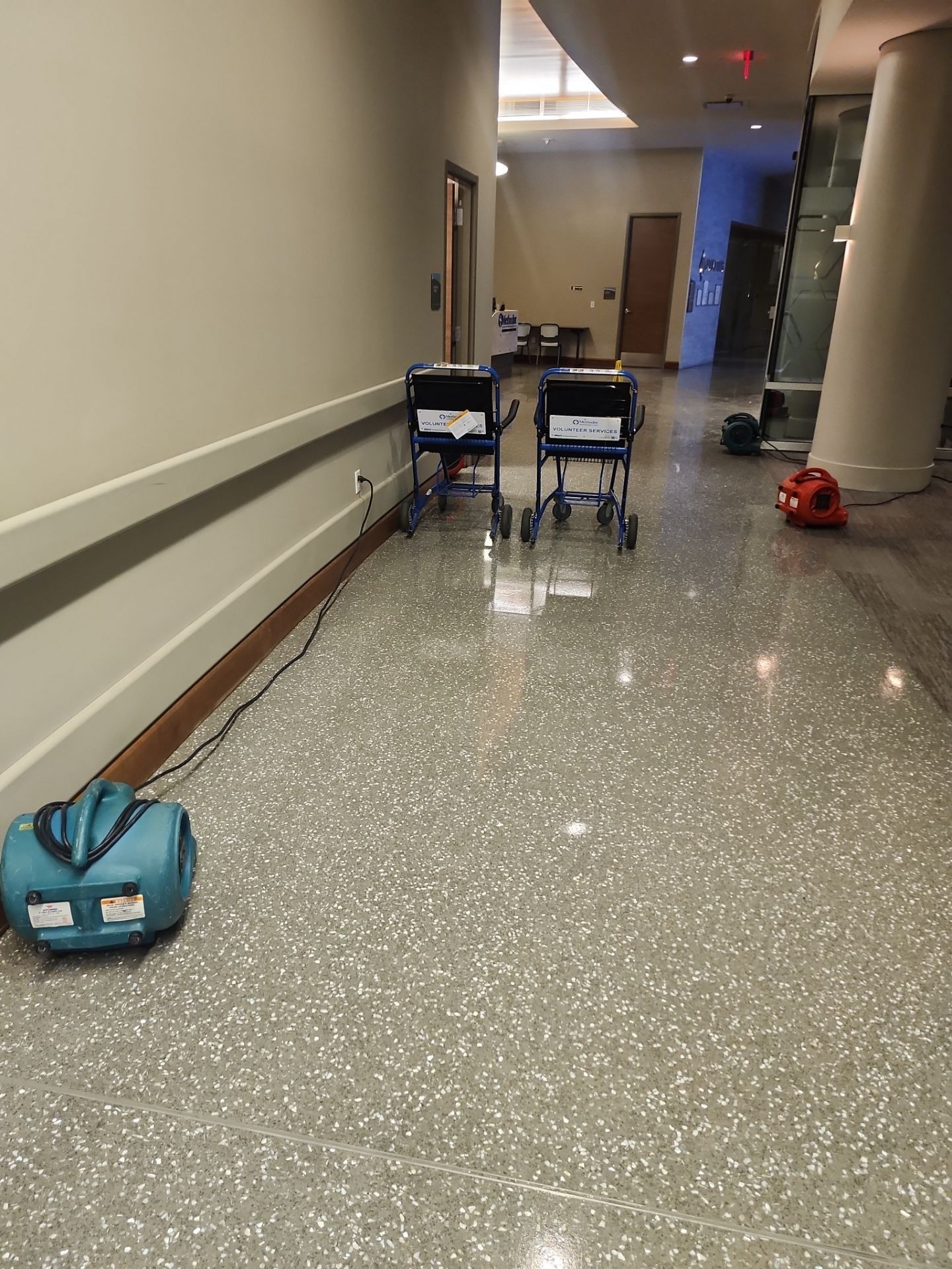 Standing water and wet baseboards found during water damage restoration in Richardson, TX