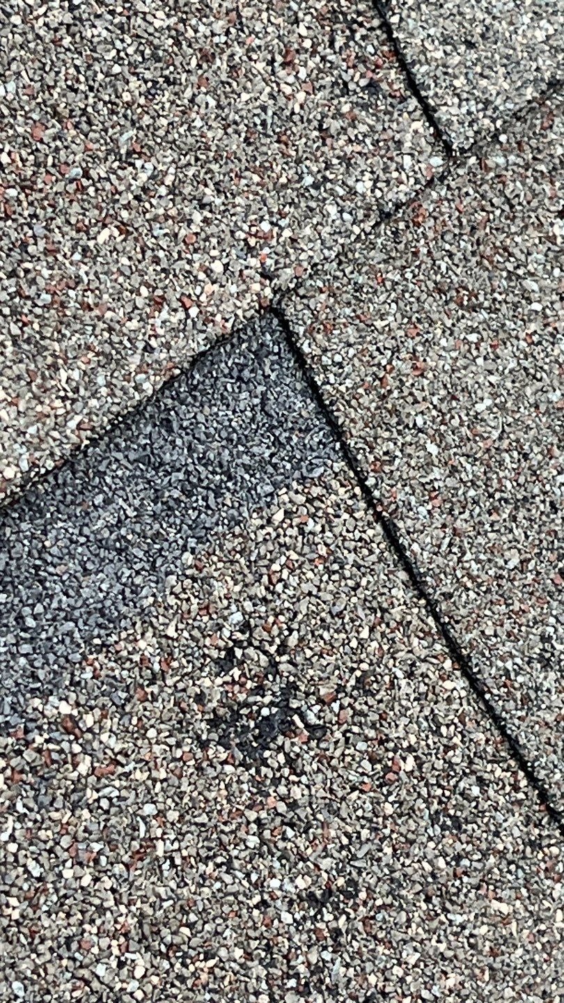 Cracked flashing found during inspection ahead of the roof replacement in Allen