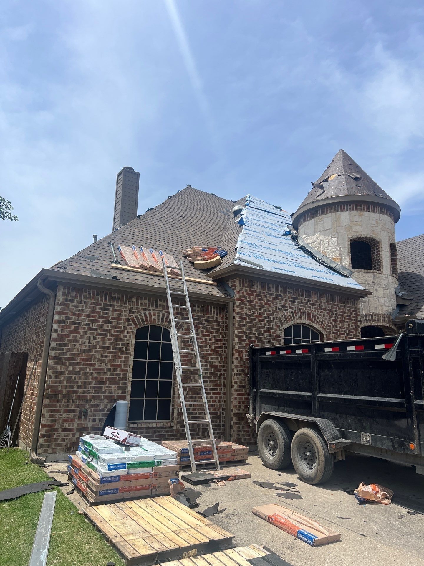 New flashing being fitted during the roof replacement in this Allen home