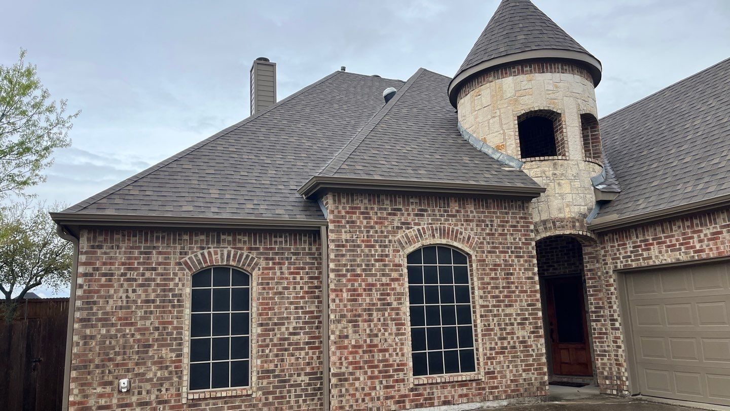 Hail bruising visible on class 4 shingles before the roof replacement in Allen, TX